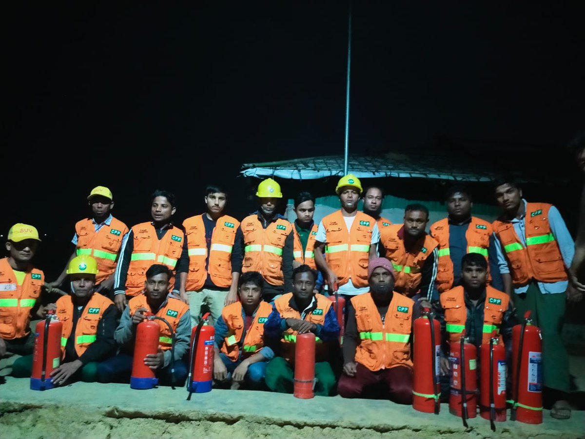 RohingyaResp's tweet photo. They know the dangers.
They have been trained.
They volunteer to protect their community.
They save lives.

#Rohingya 🇲🇲 volunteers are first responders at all hours to emergencies like this morning’s fire in Camp 5. https://t.co/f9ftEk6jgX