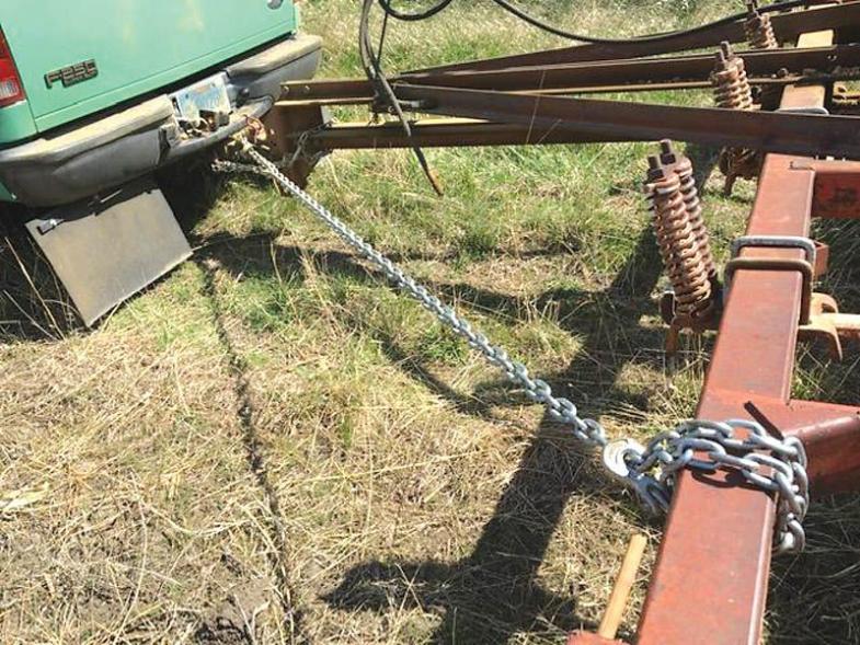 FarmShow's tweet photo. When pulling a piece of equipment with a single axle, it’ll sway back &amp; forth after you hit about 30 mph. The trick is to attach a log chain to one side that runs from the back of the pickup to the far corner of the equipment. #logchain #sway #shoptip https://t.co/4KWOsZhCUl https://t.co/gEqJyyXqEt