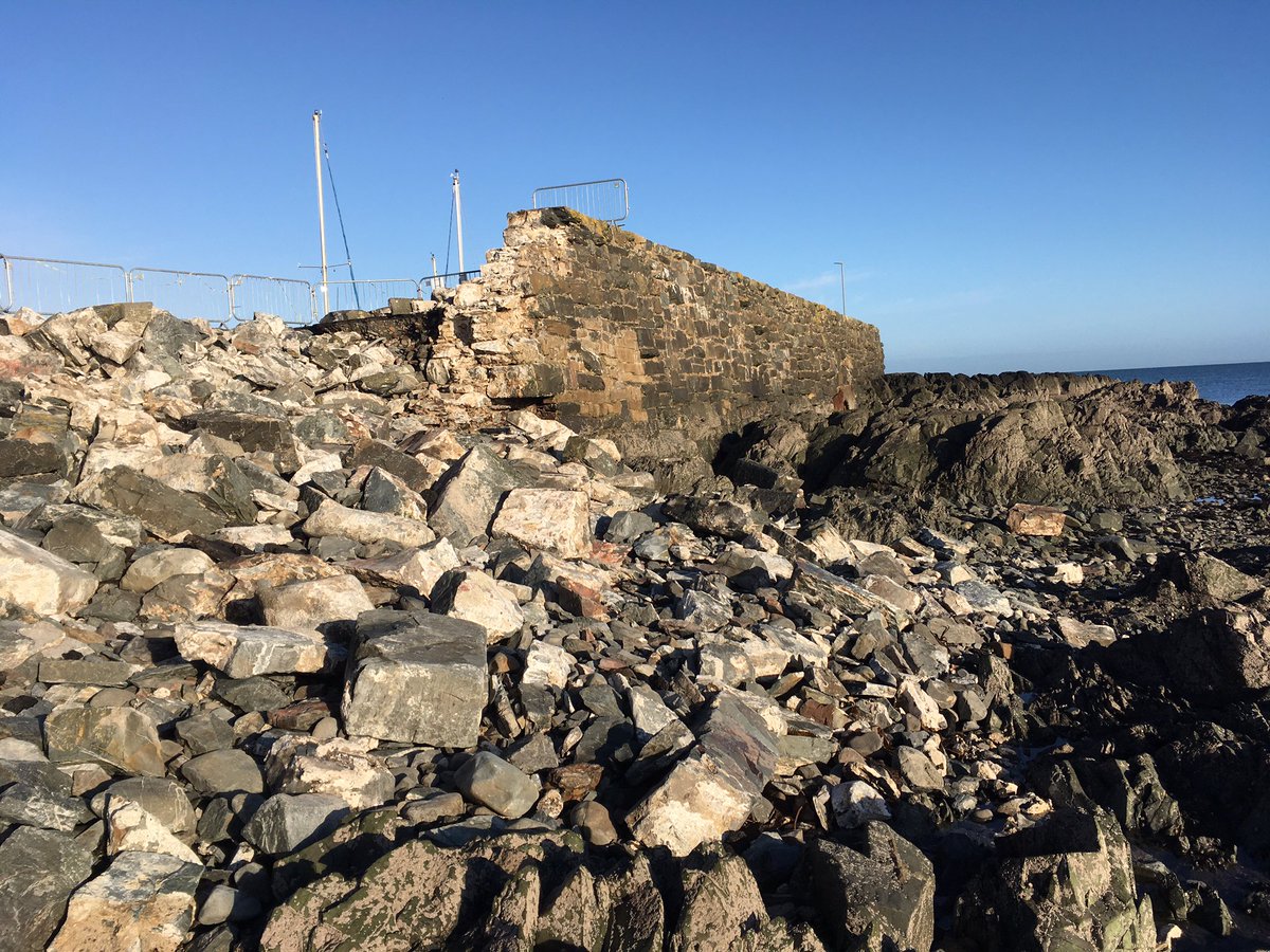 camcampbell101's tweet photo. @BallywalterPark @ianjamesparsley @ards_richard @ANDborough @StephenNolan The collapse of the harbour wall is quite incredible. The sea is such a powerful force we often forget about which is why the reasoning to change the coastal path to a cycle lane is wrong imo. 
Yes hope the fishing boats can get access very soon and normal service return 🙏🙏🙏. https://t.co/fLHvuWGTmw