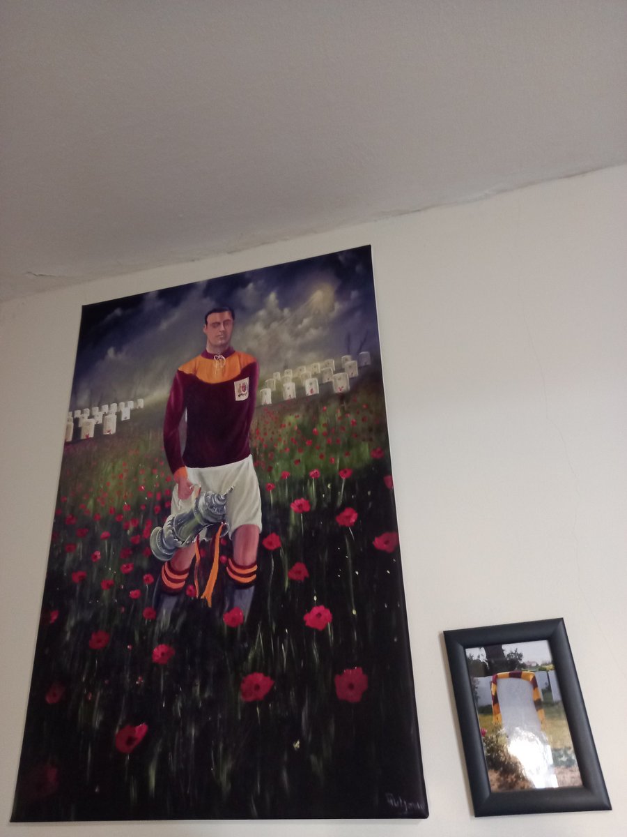paulthebantam's tweet photo. @dvidamour @FootballWW1 My copy of @StadiumPortrait picture of Jimmy Spiers. Died at Paschendale. Small frame is an actual photo of his grave in Belgium with my scarf on it. Taken by a friend on a battlefields trip. https://t.co/6DSHOr9J93