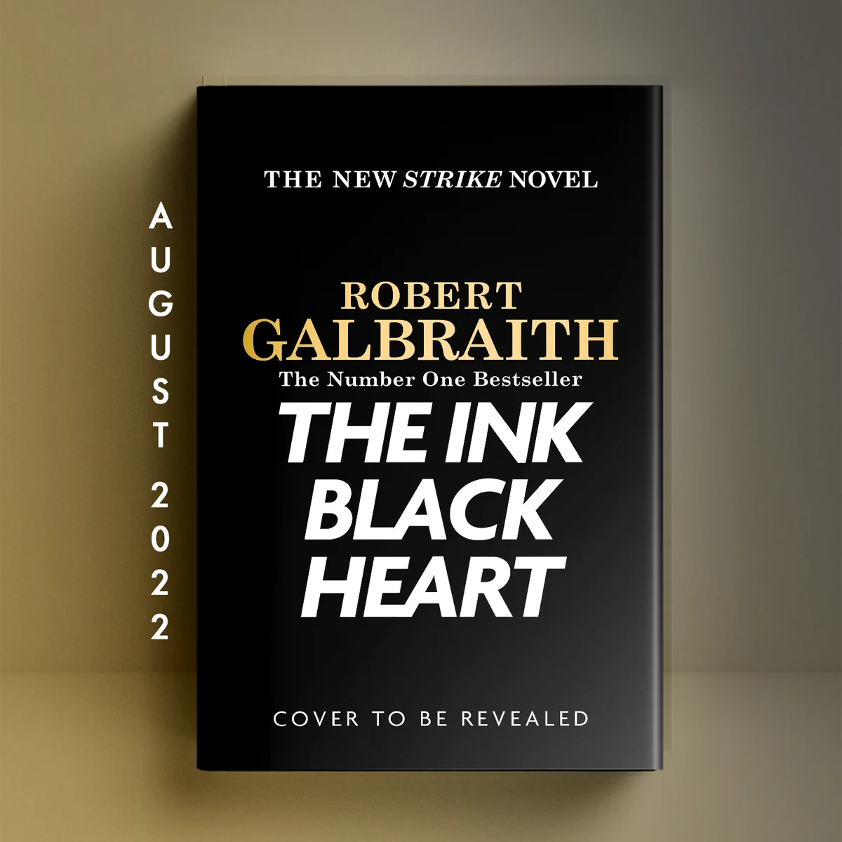 Holding cover for The Ink Black Heart by Robert Galbraith. Coming August 2022. 