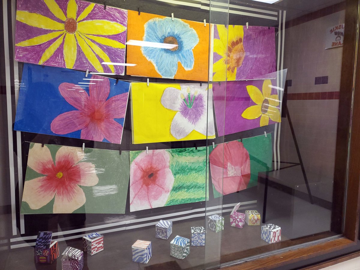 ArtCoyle's tweet photo. Putting up some fantastic student work in the hallways this morning. 7th graders studied the work of Georgia O'Keeffe and created some larger-than-life pastel flowers. 8th grade practiced atmospheric perspective in a landscape. These are so gorgeous! Great work. #gisdarts https://t.co/mqhxIFivN6