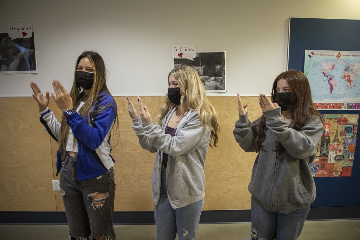 FWPS210's tweet photo. In Ms. Hundrup’s ASL classes at @federalwayhigh scholars are inventing ASL poems which they will perform for their final project. “It is interesting and unusual to see a high school class that is silent,” American Sign Language teacher Susan Hundrup shares. https://t.co/fZOKcF9BZX