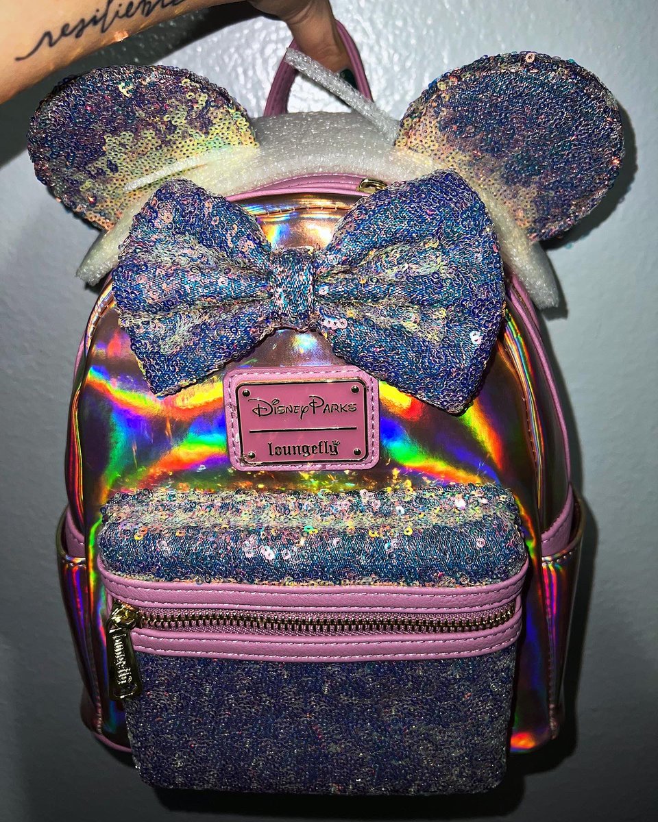 missloungefly's tweet photo. 50th Anniversary Minnie Mouse EARidescent Mini Backpack by Loungefly ✨ 

#Loungefly #DisneyWorld https://t.co/WHkxkTE5Ea