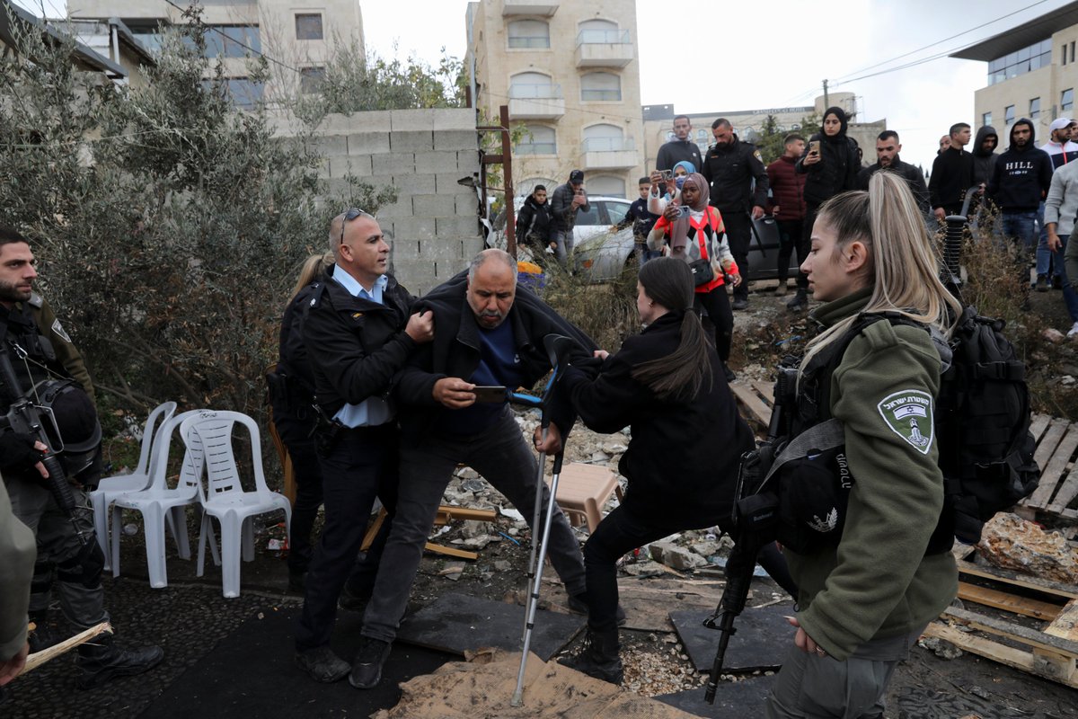 ajplus's tweet photo. Israeli police backed off from forcing a Palestinian family from their home, after they protested on the roof and crowds defended them. It is unclear if police will return.

Israel wants to displace 1,000+ Palestinians in occupied East Jerusalem to make way for illegal settlers. https://t.co/pzKgZPjMqT