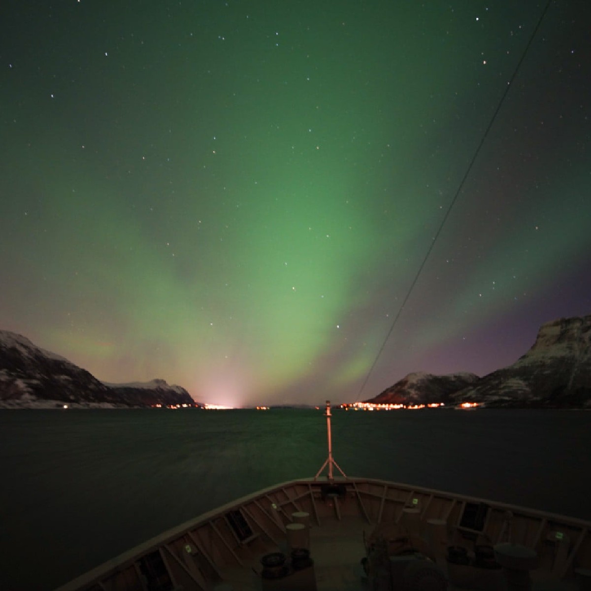 Hurtigruten's tweet image. It's not every day we get to see the Northern Lights as far south as Ålesund - but this time we did 🤩 Have you ever seen the Aurora Borealis this far south?