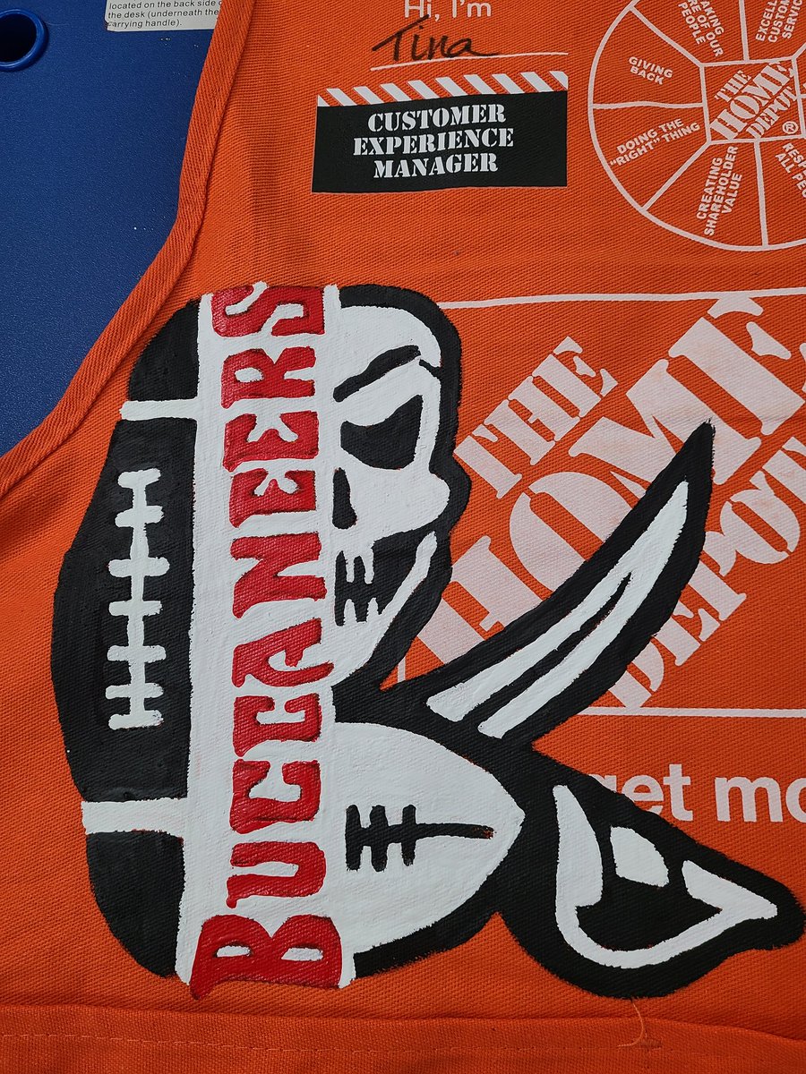Tina Campo (@tcampo24) on Twitter photo Got promoted to a management position, so that came with a new apron, but I can't break my playoff apron tradition and I gotta say, I'm obsessed with it! GO BUCS!! 🏴☠️🖤❤ <a href="/Buccaneers/">Tampa Bay Buccaneers</a> Got promoted to a management position, so that came with a new apron, but I can't break my playoff apron tradition and I gotta say, I'm obsessed with it! GO BUCS!! 🏴☠️🖤❤ <a href="/Buccaneers/">Tampa Bay Buccaneers</a>