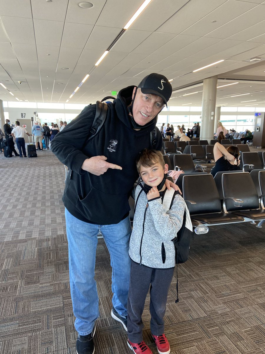 karlaanolan's tweet photo. My grandson was on the same flight as @JimKelly1212 what an awesome guy to stop and take a picture with him!! Such a class act!! Thank you ❤️💙🏈🦬@BuffaloBills @BuffaloFAMbase https://t.co/jRNinlkwLF