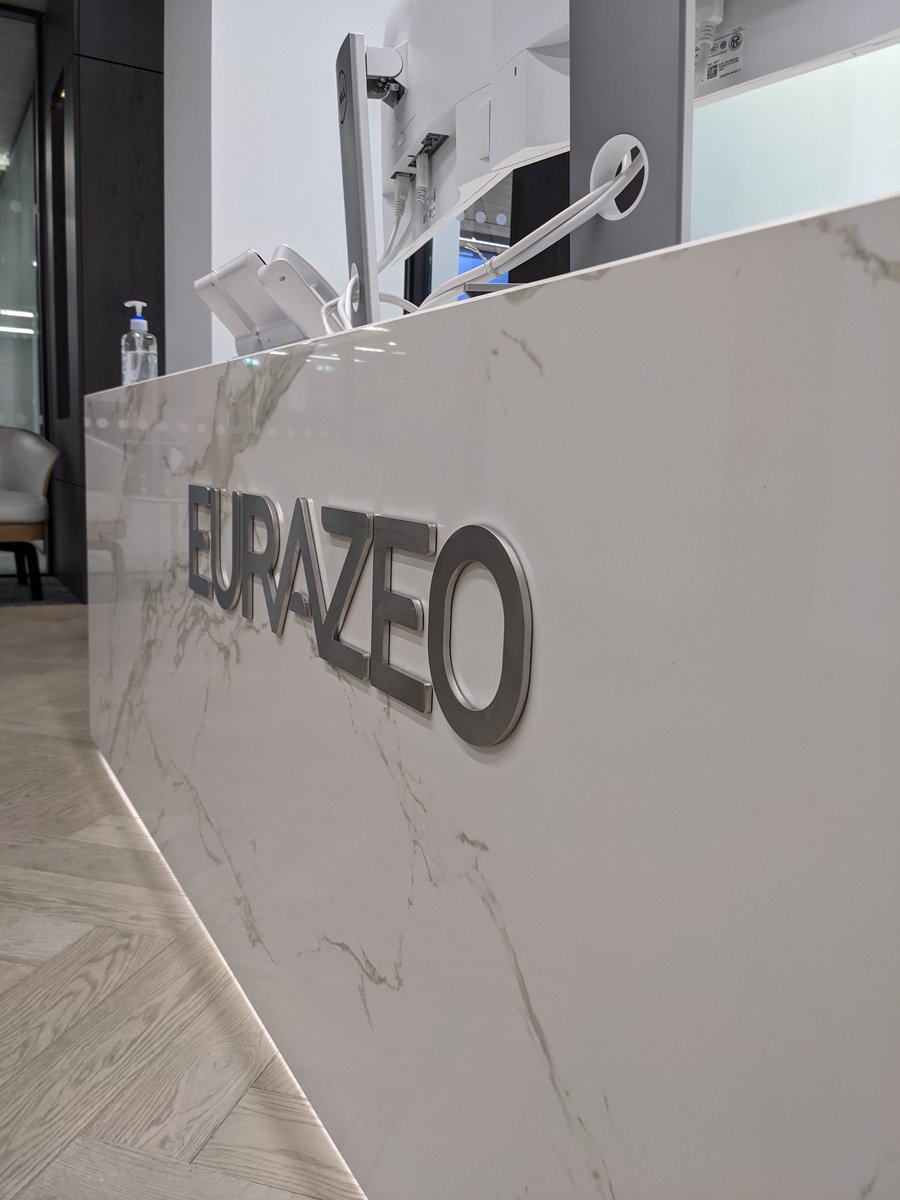 Brushed stainless signage and computer cut graphics for client in Mayfair.