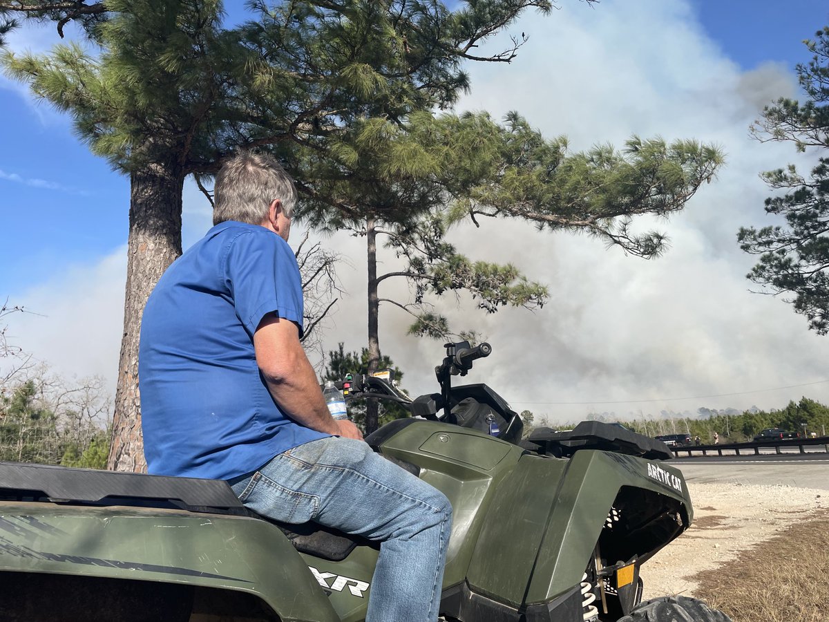 DanielMarinKXAN's tweet photo. An anxious property owner watches smoke rise near #RollingPines fire in #Bastop County โ Updates to come on โฆ@KXAN_Newsโฉ https://t.co/55FTL8vOFf