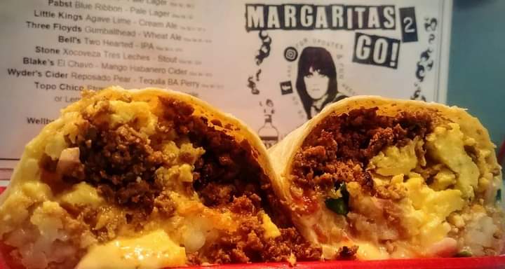 Order our breakfast burrito tonight. The Vacation has chorizo, scrambled egg, tater tots, queso, pickled red onions, shredded cheese, &amp; scallions.
#burrito
