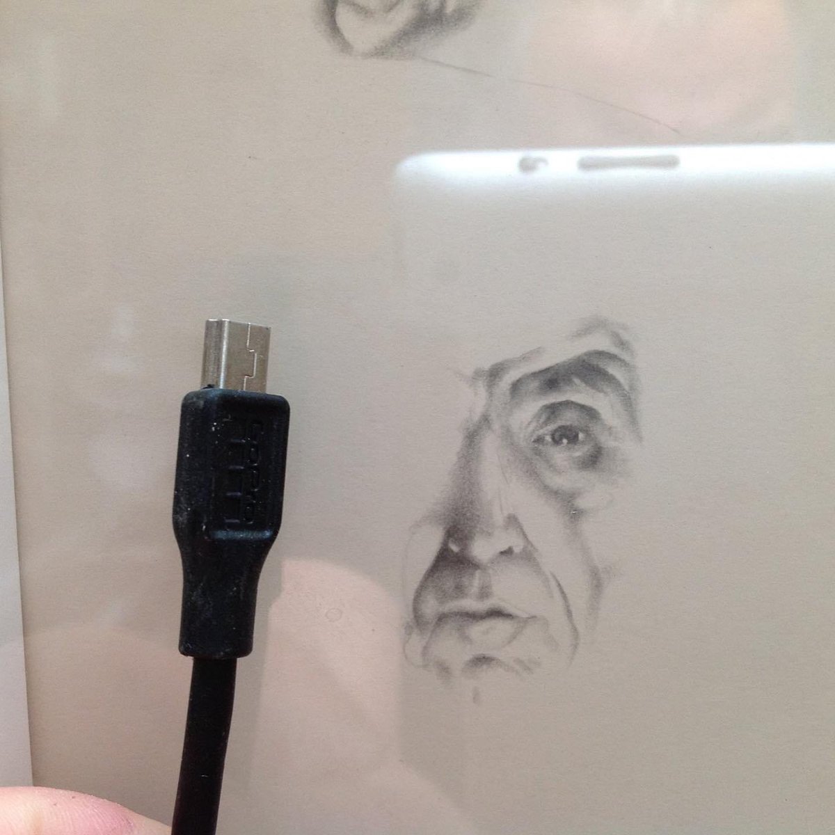 Opipop's tweet photo. This tiny study {see USB plug}was made by eye only, an exercise in accuracy based on Wright of #Darby. Took about 3 hours to #draw. For fun. I was looking 2B accurate without gridding up. #pencil on #cartridgepaper #Nairn #Scotland circa 1993 #drawing #lessons #practice #art https://t.co/84OwZstc4J