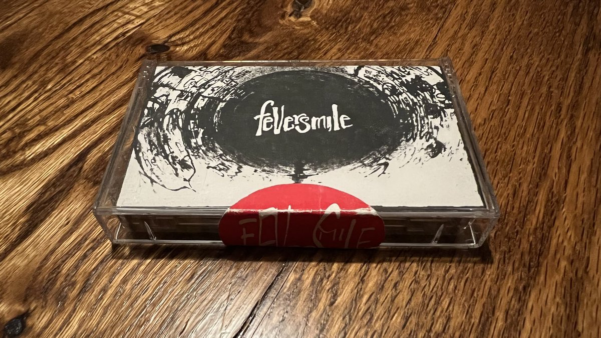 MetalCoder's tweet photo. @chipmidnight Among other items, I still have a sealed Feversmile cassette. It’s got their manager’s name and number from 1992 on the back. :) https://t.co/QhYPJ4ITNq