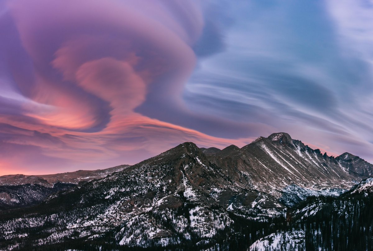 This morning we were visited by aliens. This shot, taken about 30 minutes before sunrise was not with some crazy fisheye lens, it actually looked like this. Never have I seen lenticular clouds shaped like this.