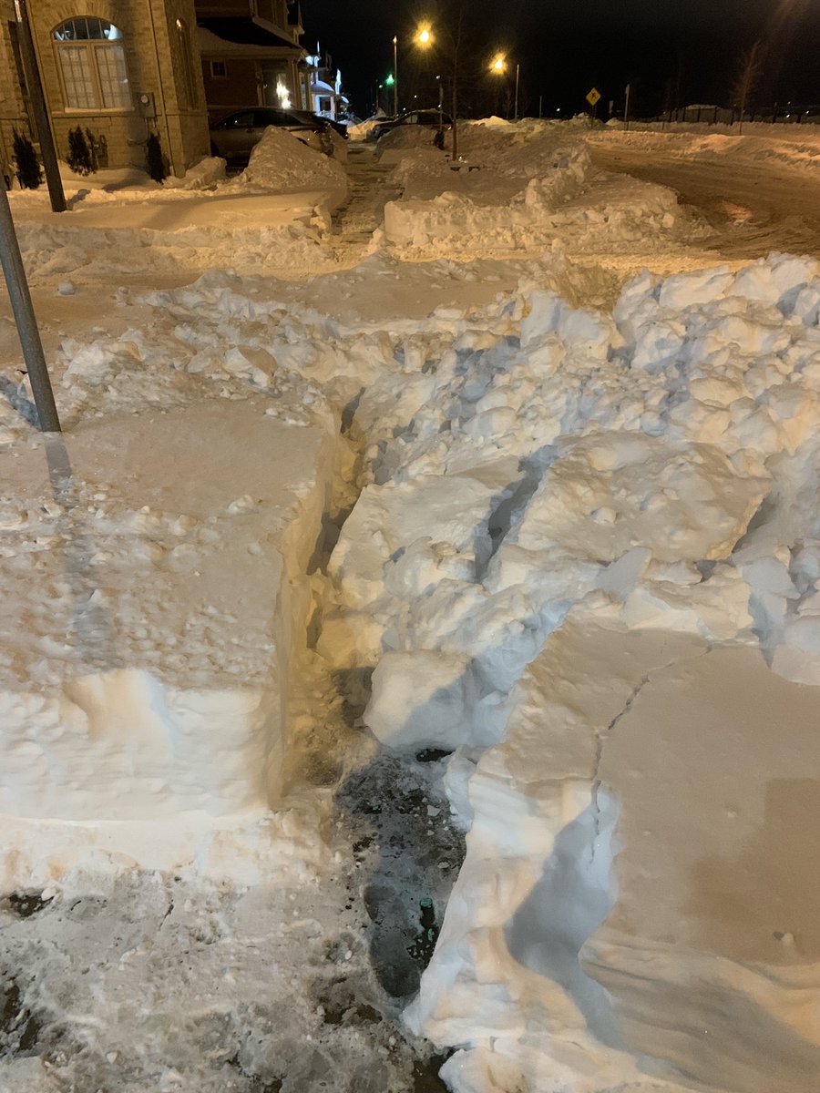 __m2k___'s tweet photo. Street plows shoved all the snow on our sidewalk. Meanwhile the other side has small plows cleaning the school sidewalk. Why not our side? This is too much. We need to change this. @newsdurham @RegionofDurham @TownOfAjax #Ajax #snow #durham https://t.co/SkYxr0Gck8