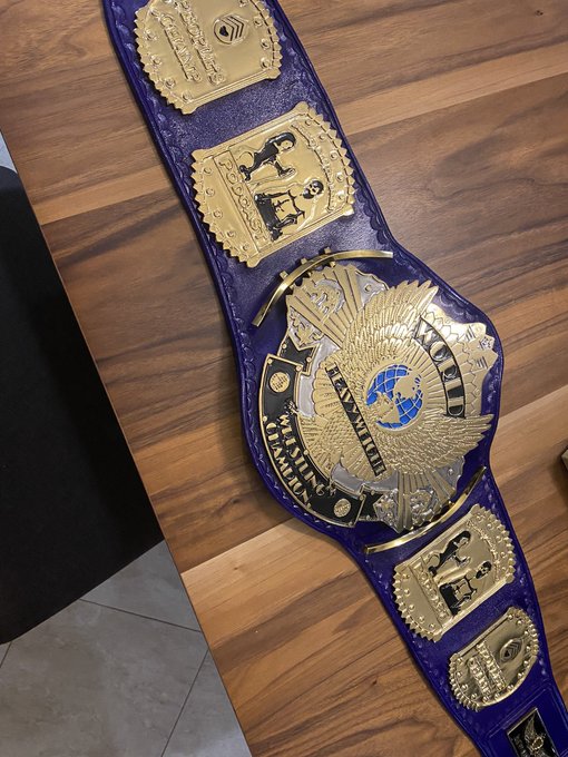 1 pic. Thank u @Maxprowrestler @mw_belts love this .. the details are awesome. The peoples champ belt