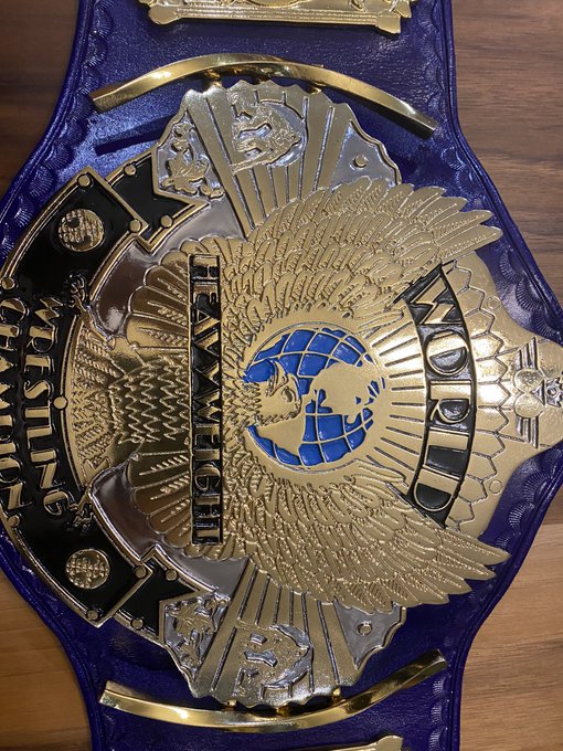 4 pic. Thank u @Maxprowrestler @mw_belts love this .. the details are awesome. The peoples champ belt