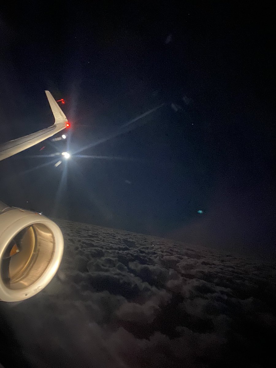 RobVellinga's tweet photo. I see you #WolfMoon under the left wing of@my @AmericanAir flight into Miami tonight. 

Great views and lighting and reflection off the ocean. https://t.co/iB3LPbPViG