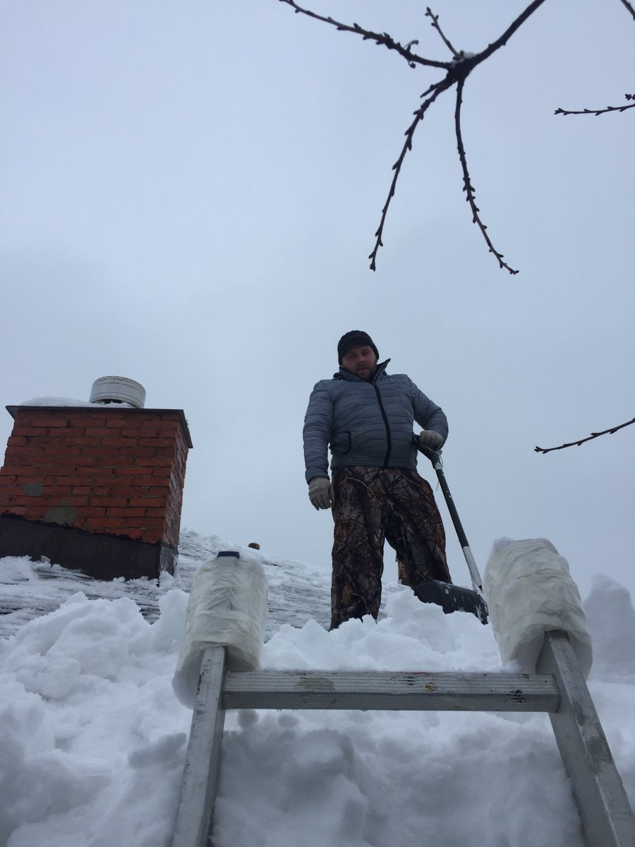 exeyaro's tweet photo. Snow looks nice but it has to be cleared, even from roofs.  Aleksei Volkov at work. https://t.co/Sqy35PTYAf
