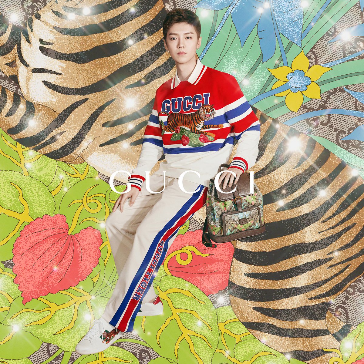 Against an illustrated background of tigers, Global Brand Ambassador #LuHan is photographed by #AngeloPennetta for the second part of the #GucciTiger campaign. Creative Director #AlessandroMichele, Art Director #ChristopherSimmonds. Discover more on.gucci.com/_GucciTiger
