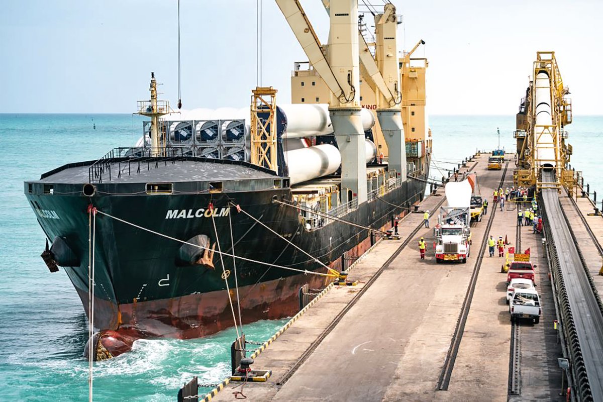 LH_Maritime's tweet photo. After a safe voyage from Italy to Colombia across the Atlantic Ocean, the 148 m long MV Malcolm of our customer #dship entered the Caribbean Sea with a wonderful view. At Puerto Brisa terminal, our ship cranes type CBB 3450-240 unload the wind turbine equipment with great care. https://t.co/vkcHwfGThO