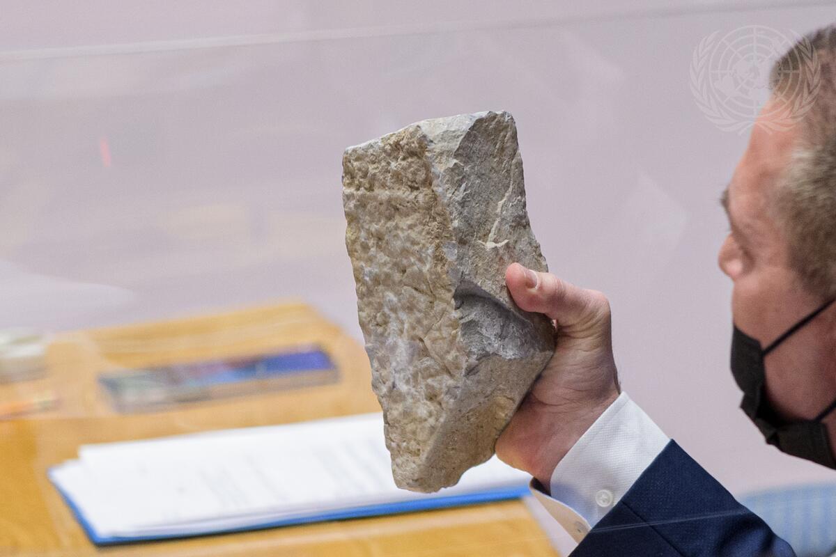 LahavHarkov's tweet image. .@giladerdan1 shows the UN Security Council a large rock like the kind Palestinians threw at Israeli vehicles 1,775 times in 2021: "If a rock like this would hit your car while you drove home with your children, wouldn't you think this is a terror attack that must be condemned?"