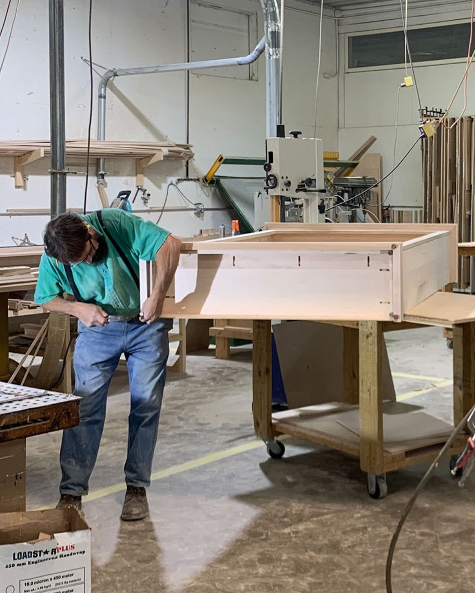 Fusion_Designs_'s tweet photo. Here we have one of our skilled craftsmen, June, working away on a bookcase! https://t.co/q3AGIj5nGA