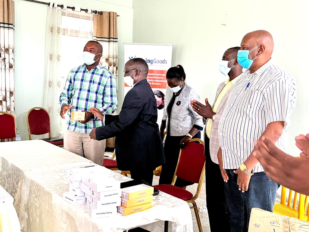 Dr.Upenytho George, Commissioner Community Health <a href="/MinofHealthUG/">Ministry of Health- Uganda</a> handing over 300 smartphones and 8 tablets to the Ntungamo District local government for use by VHTs and supervisors in the initiative to digitize community health. #eHealth #digitalhealth #mhealth