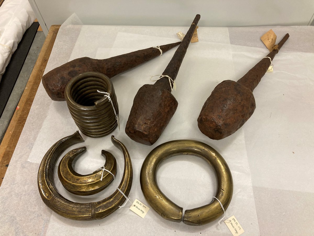 PowellCotton's tweet photo. Today's #WhatsInStoreWednesday is all about HEAVY objects. These brass necklets and bracelets, and iron bride money (all from Cameroon), all weigh between 2-15lbs. We've been repacking them from big crates to smaller boxes so that we can lift and move them safely. https://t.co/LmCKxGfmVs