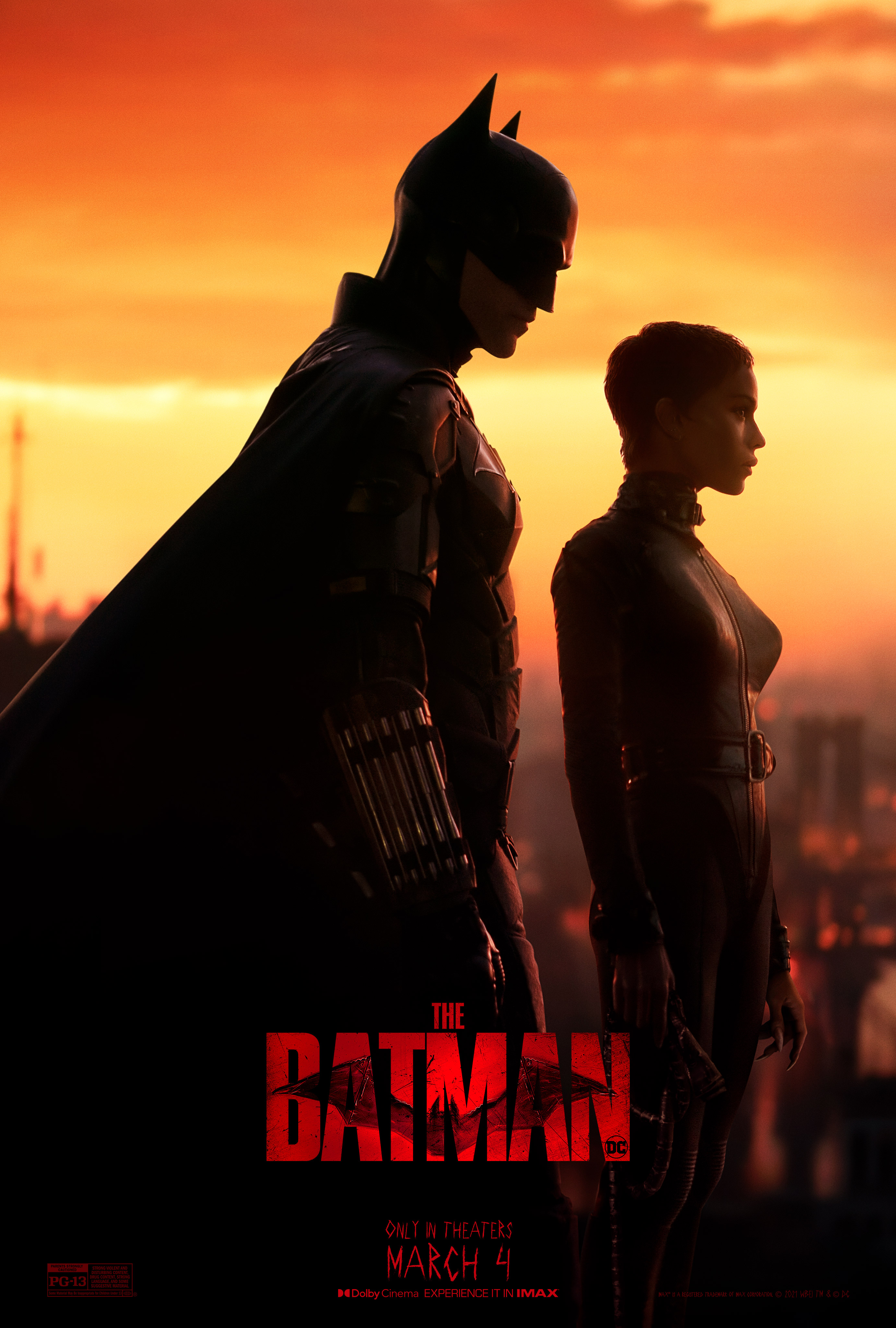 New poster for THE BATMAN. Pictured, Batman is standing behind Catwoman against an orange sky. 