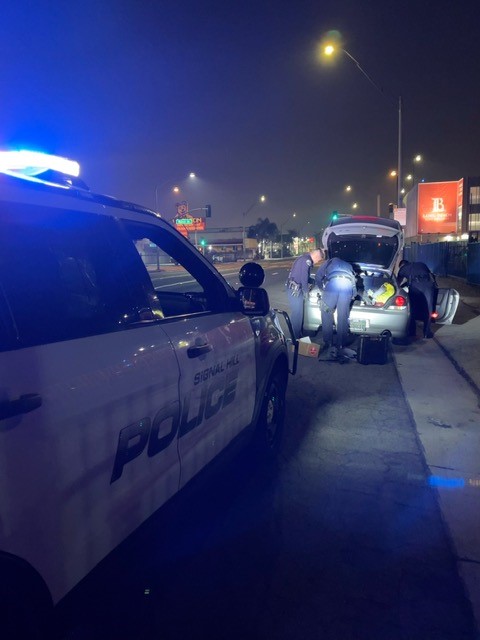 SignalHill_PD's tweet photo. In the early morning hours, SHPD officers spotted a stolen vehicle traveling through our city.  During a search of the vehicle, Officers Kenney, Reyes, and Alcorn located illegal drugs and paraphernalia.  The driver was #arrested and booked for narcotics charges.  #NotOnOurWatch https://t.co/aGXwE5d6eE