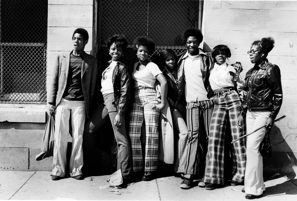 A group of fashionably dressed young men and women. Chicago, IL. Photo by Robert Natkin (1973)