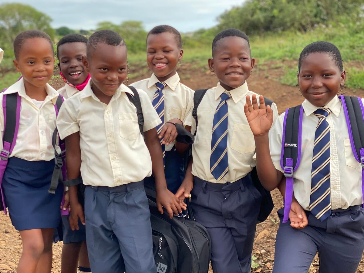 StarForLife_SA's tweet photo. For many learners, today marks the first day back to school in the new academic year. Star for Life coach, Skhumbuzo Mnguni, is seen welcoming back learners at Hluhluwe Public Primary School. 
#starforlife #Back2School #empoweringyouth https://t.co/Ax6GrXHwaj