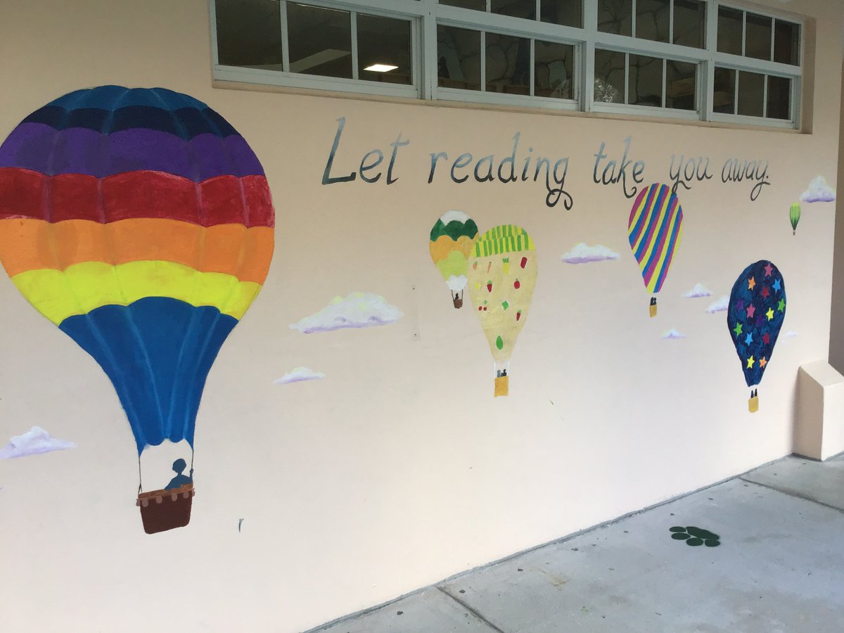 PineCrestArts's tweet image. The #PCMiddleSchool Art Club finished a mural on the Rubenstein/Silvers Library wall. Each student painted their own unique hot air balloon to &quot;Let Reading Take You Away.&quot; #PCVisualArts #PCLibrary