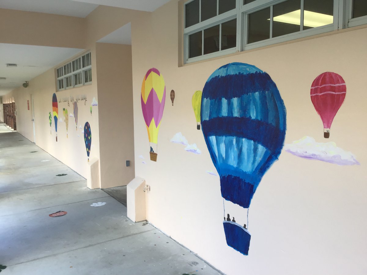 PineCrestArts's tweet image. The #PCMiddleSchool Art Club finished a mural on the Rubenstein/Silvers Library wall. Each student painted their own unique hot air balloon to &quot;Let Reading Take You Away.&quot; #PCVisualArts #PCLibrary