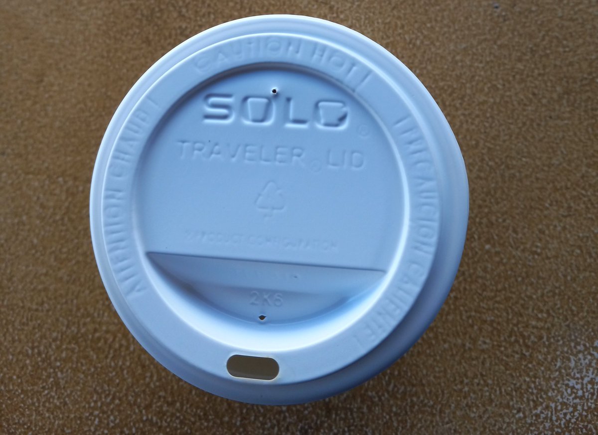 please bear with me here I had a use a filter so you can see it better drinking some tea and the lid is somewhat blurry in real life seeing it in person tho is cooler it looks like a illusion it's looks like I'm really close to the lid but I'm not #Illusion