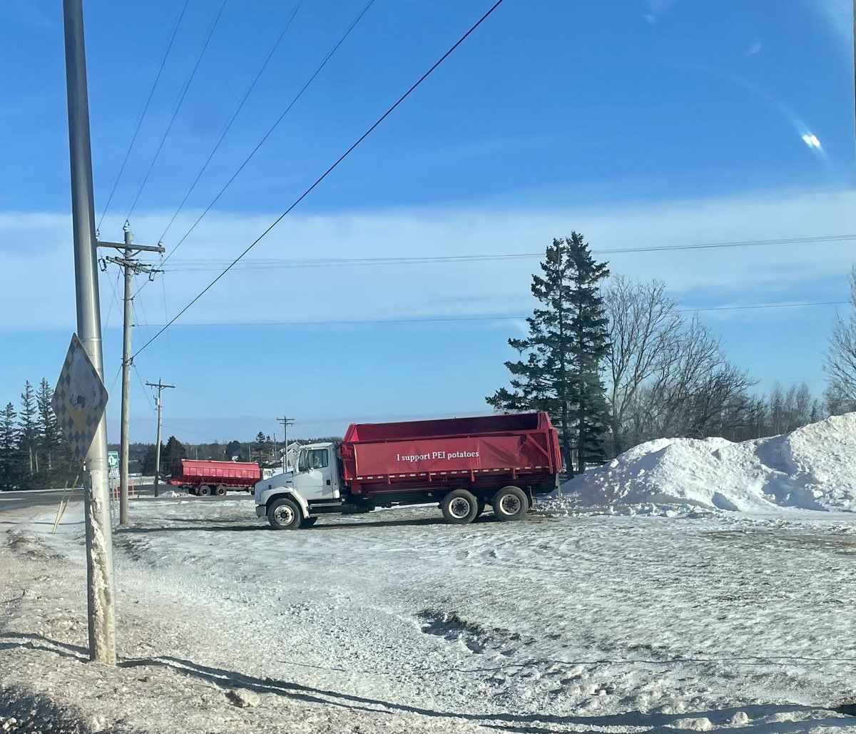 Pair of Potato trucks helping to raise awareness in hopes of getting the border open. #isupportpeipotatoes   #letsgetthatborderopen. #eatmorepotatoes