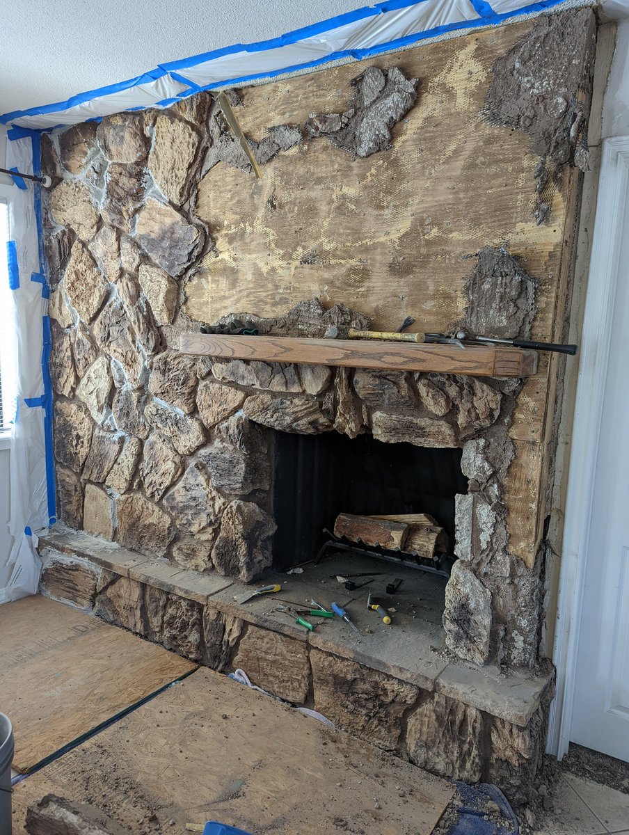 loft305's tweet photo. While demoing our fireplace facade we found another faux stone fireplace facade behind it - as well as a 60's era @MagnavoxCo TV! Previous contractor must have just pushed the cabinet &amp; TV back. Now we have space for a wet bar. 😂 #foundtreasure #remodeling https://t.co/X2EhKJJpN1