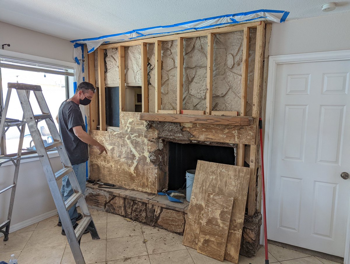 loft305's tweet photo. While demoing our fireplace facade we found another faux stone fireplace facade behind it - as well as a 60's era @MagnavoxCo TV! Previous contractor must have just pushed the cabinet &amp; TV back. Now we have space for a wet bar. 😂 #foundtreasure #remodeling https://t.co/X2EhKJJpN1