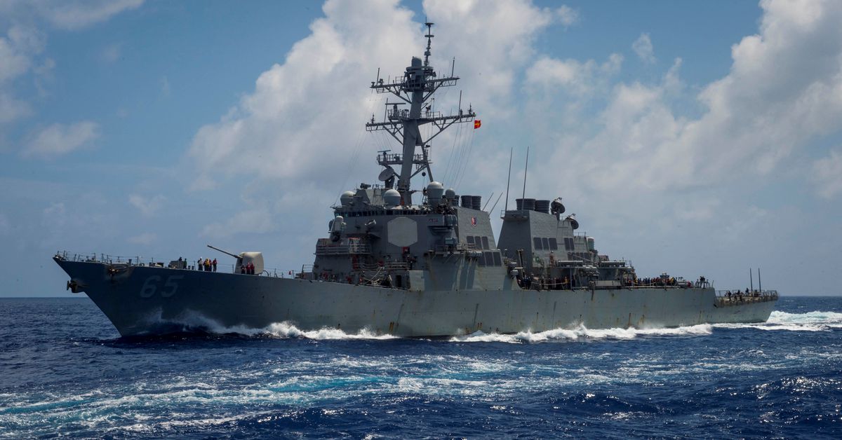 ReutersWorld's tweet photo. China says it warned away U.S. warship in South China Sea, U.S. denies https://t.co/gDpRmldVFu https://t.co/dsEJNioKUb