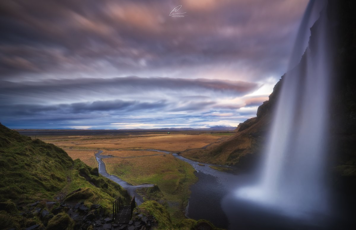 mauy85's tweet photo. Clouds and colors - Seljalandsfoss #Iceland #waterfalls #Travel #photography https://t.co/F3j9J1rs1V