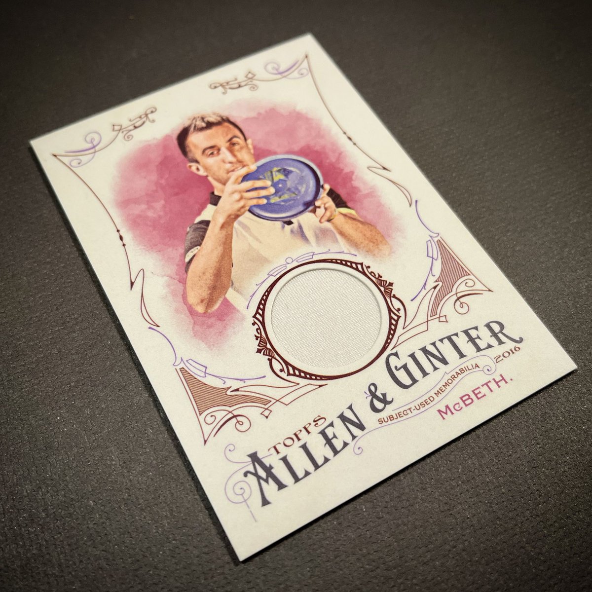 BrixtonDiscGolf's tweet image. This is a 2016 Topps Allen &amp;amp; Ginter Paul McBeth relic card. It is a beauty and one of my favorites in my collection. There are only a handful of disc golf cards available today that feature game used memorabilia. We will be changing that very soon. #DiscGolf #ComingSoon