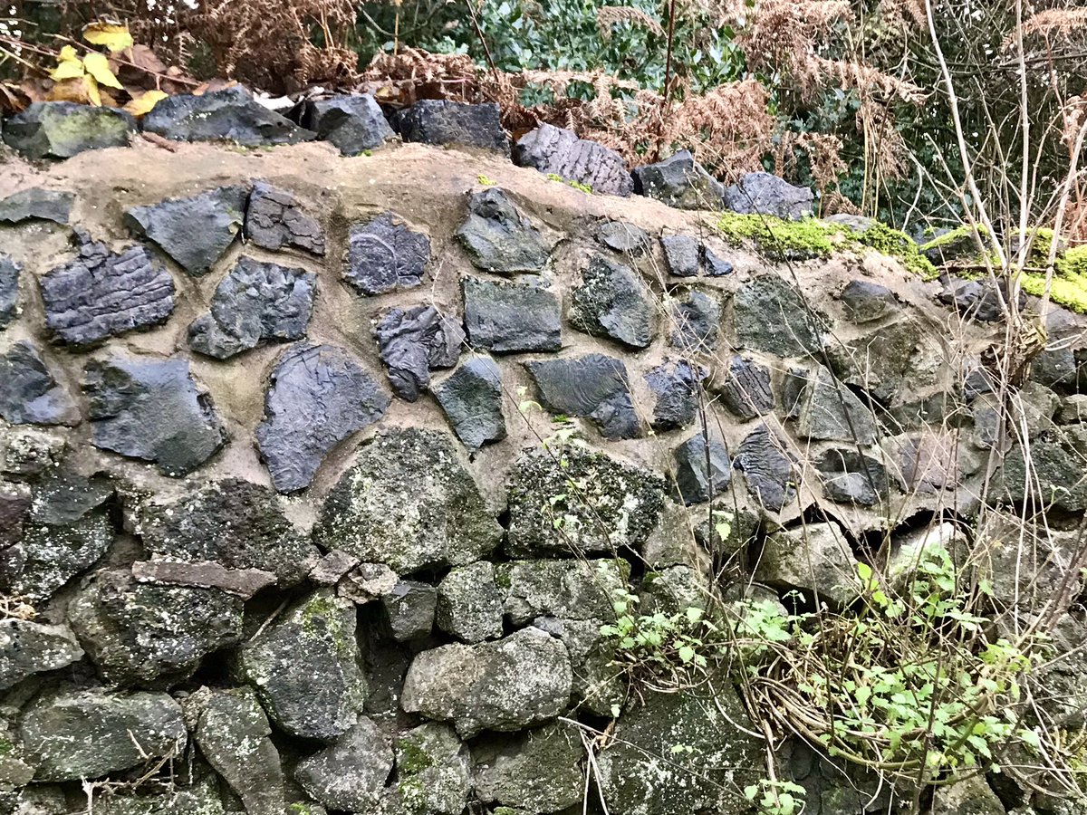 Looking sideways as well as up and down sometimes pays off, furnace slag used to repair an old stone wall #Walls #walking #industrialhistory #recycling