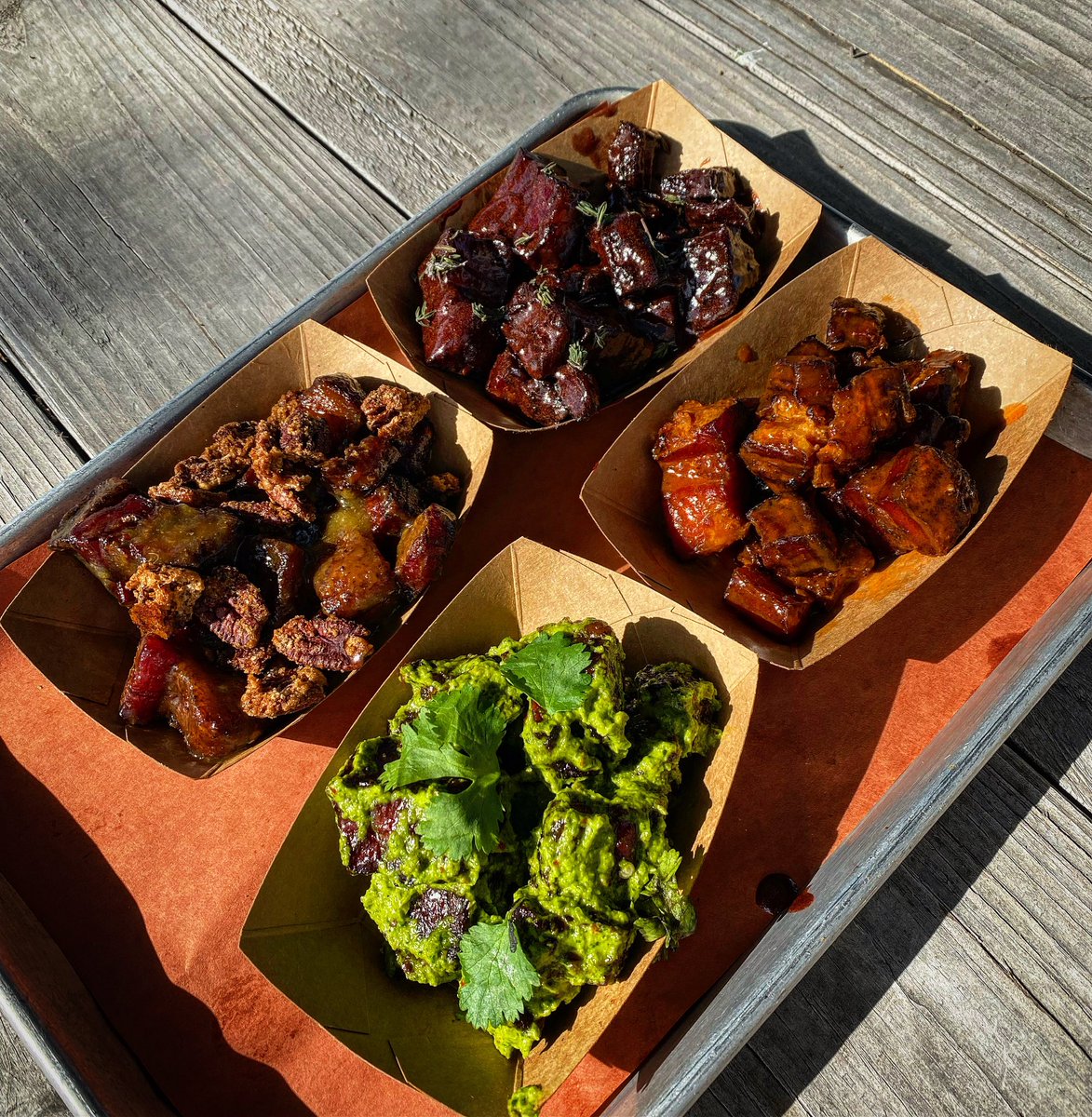 We hinted at some new burnt end flavors at the end of 2021, and as promised, here they are!! Clockwise from the top: chef @davidferlet’s Dr. Pepper sauce, original Buffalo (couldn’t get rid of the namesake), Tex’maican Jerk, and peach bourbon topped with candied pecans.