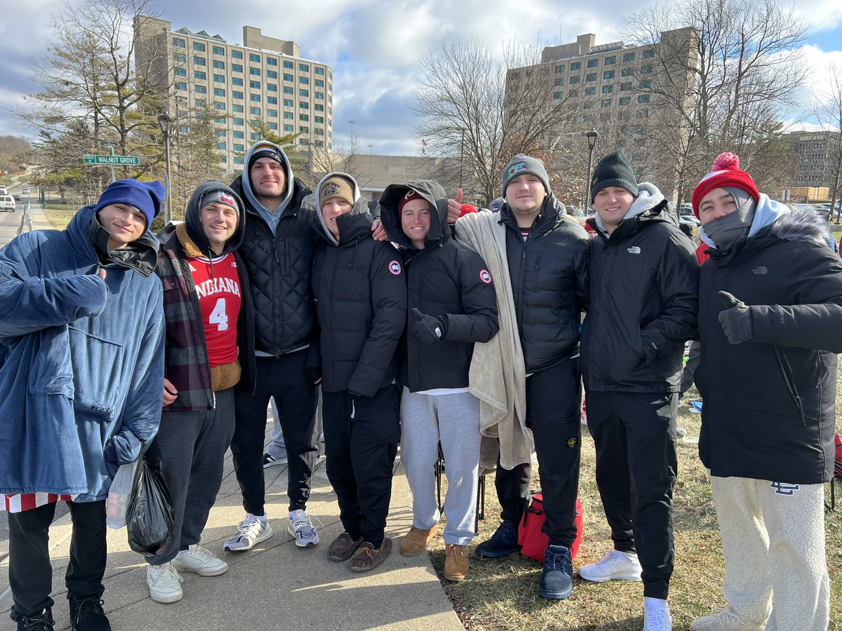 gnybarra's tweet photo. This group of Indiana seniors camped out in freezing temps overnight at Assembly Hall to make sure they were first in line for the game today. Don’t worry, Dane Fife got them Dunkin’ this morning #iubb https://t.co/KFmKgWBvZk