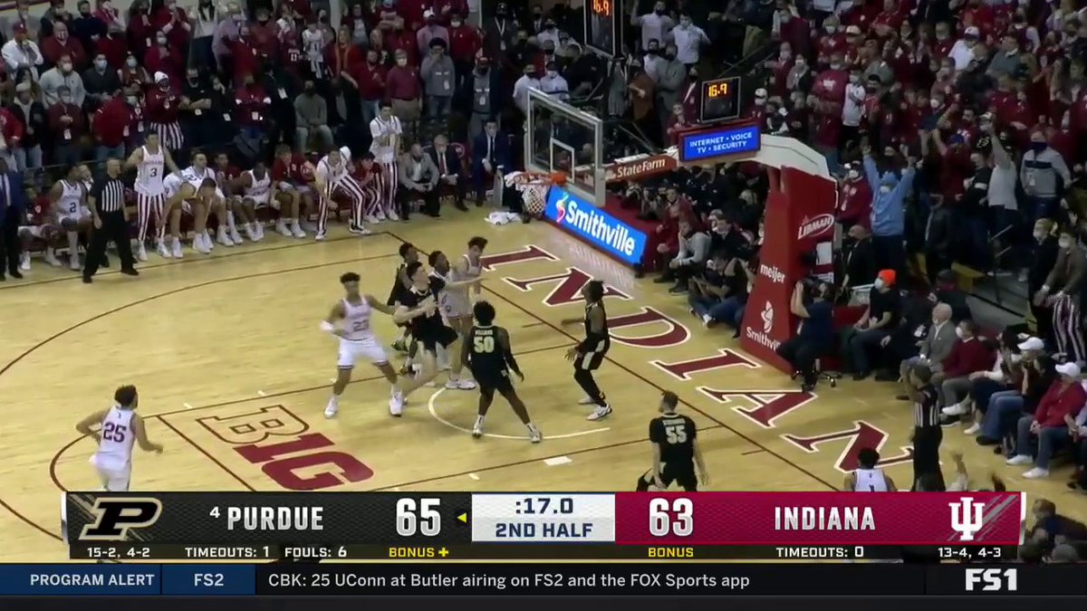 Purdue's Jaden Ivey drives hard to the basket and finishes a tomahawk dunk  on Indiana