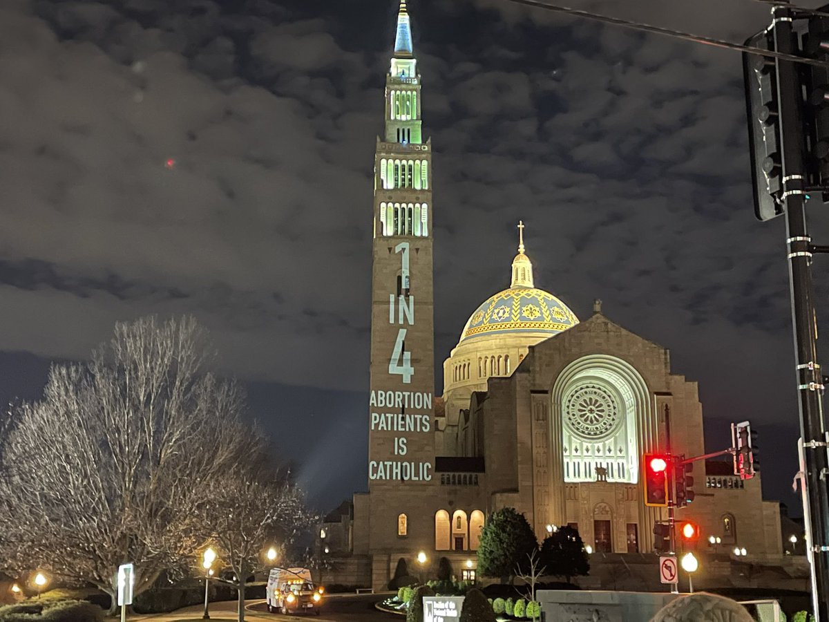 While pro-choice demonstrators held defiant light show outside National Shrine during the annual pre-March Vigil, making his debut as USCCB Pro-Life chair inside amid hopes for Roe’s end, +Lori notably tones down the homily from his predecessor’s red meat: https://t.co/C15xJjWysU https://t.co/hVodvisd7G