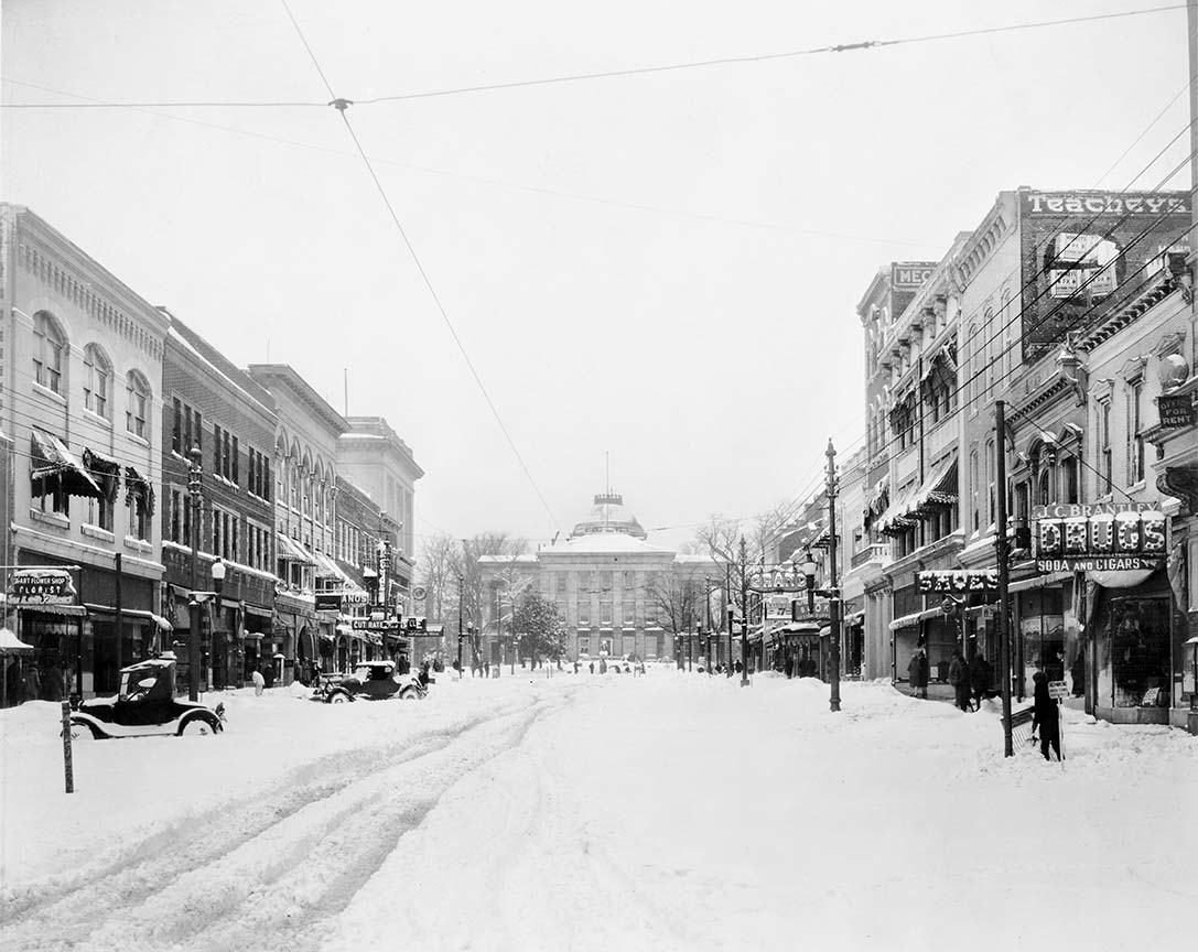 Circa 1920, take a look at a snowy <a href="/ncstatecapitol/">NC State Capitol</a> on Fayetteville Street in Raleigh! ❄️

Stay warm, everyone!