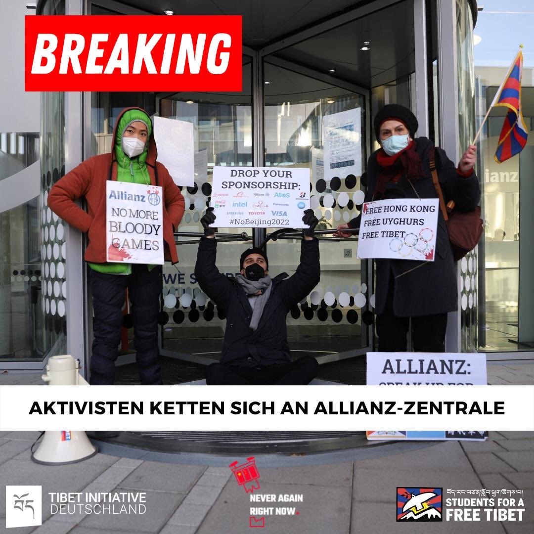NARNCampaign's tweet photo. 🚨BREAKING!🚨

Jewish &amp; Tibetan activists are currently chained to the doors of the @Allianz headquarters in Berlin. They are demanding an end to its sponsorship of #Beijing2022.
A company which profited from the Holocaust must not turn a blind eye to the Uyghur genocide. https://t.co/VZ6Fmmf7A8