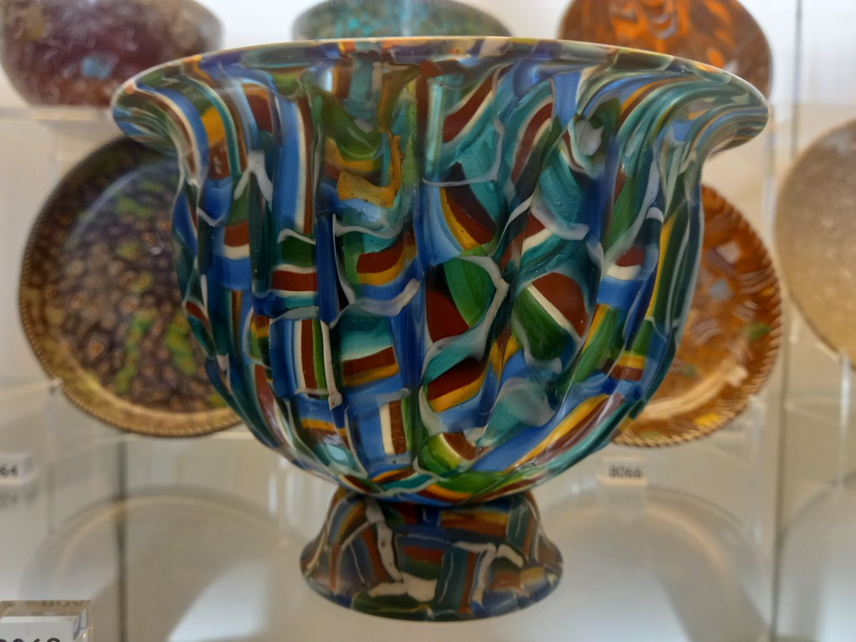 DrJEBall's tweet image. A colourful #Roman glass bowl, probably made in Italy 25BC-AD50. For a while it was thought to be a C19th fake, but scientific analysis suggests it is almost certainly from antiquity - made by/for someone who liked colour! On display at the V&amp;amp;A (London) #RomanArchaeology
